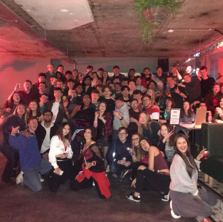 A photo of a group of students taking a photo at Market Shaker.