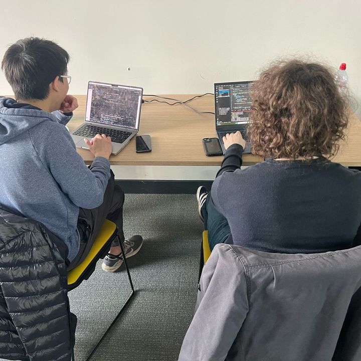 Two NUCATS members working on a hackathon in partnership with Kerridge.