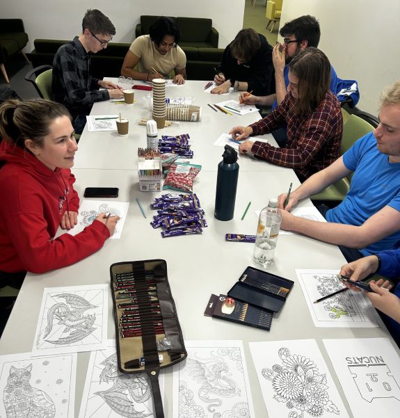 A photo of NUCATS members at an art workshop.